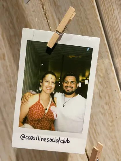 A polaroid from the stand, pegged on the line.
