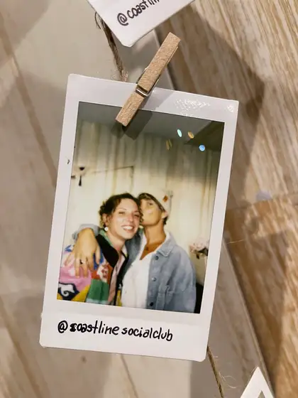 A polaroid from the stand, pegged on the line.
