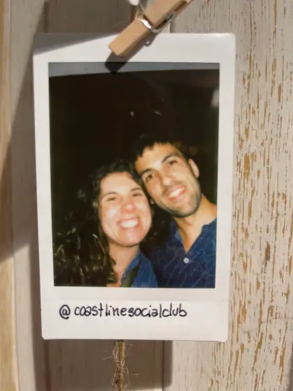 A polaroid from the stand, pegged on the line.