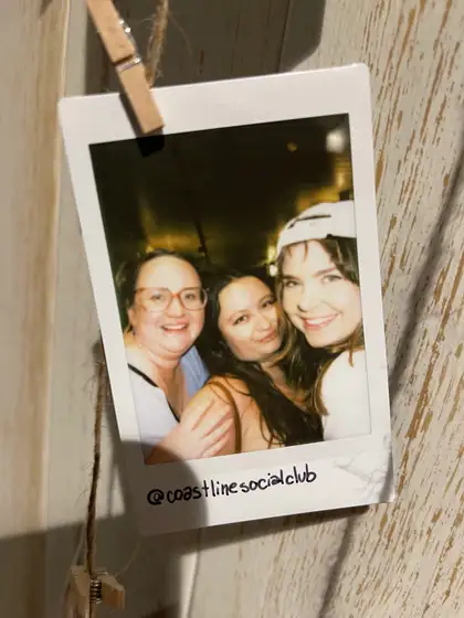 A polaroid from the stand, pegged on the line.