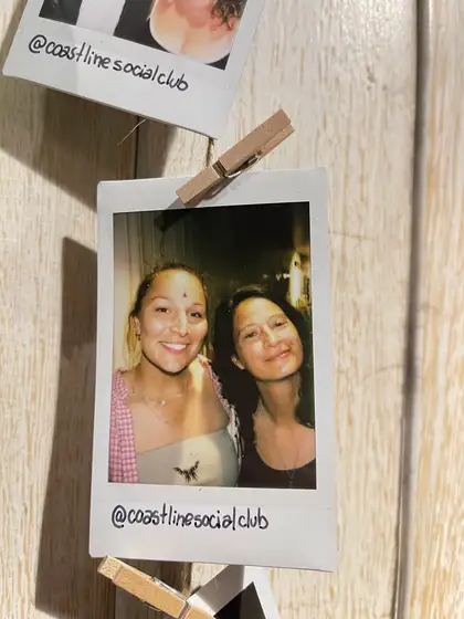 A polaroid from the stand, pegged on the line.