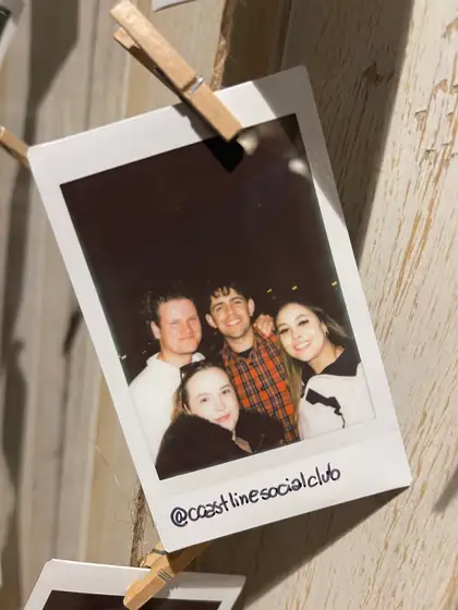 A polaroid from the stand, pegged on the line.