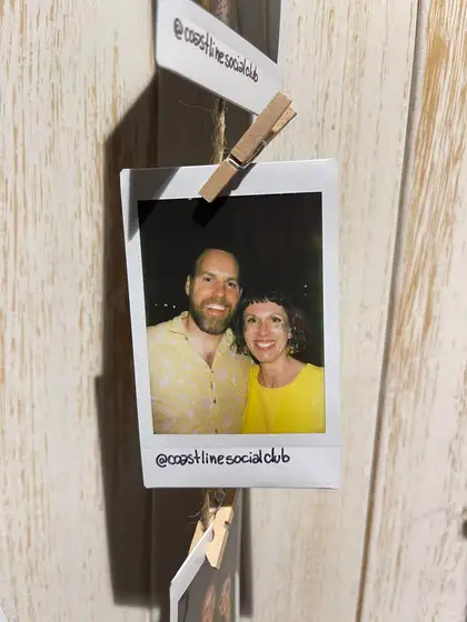 A polaroid from the stand, pegged on the line.